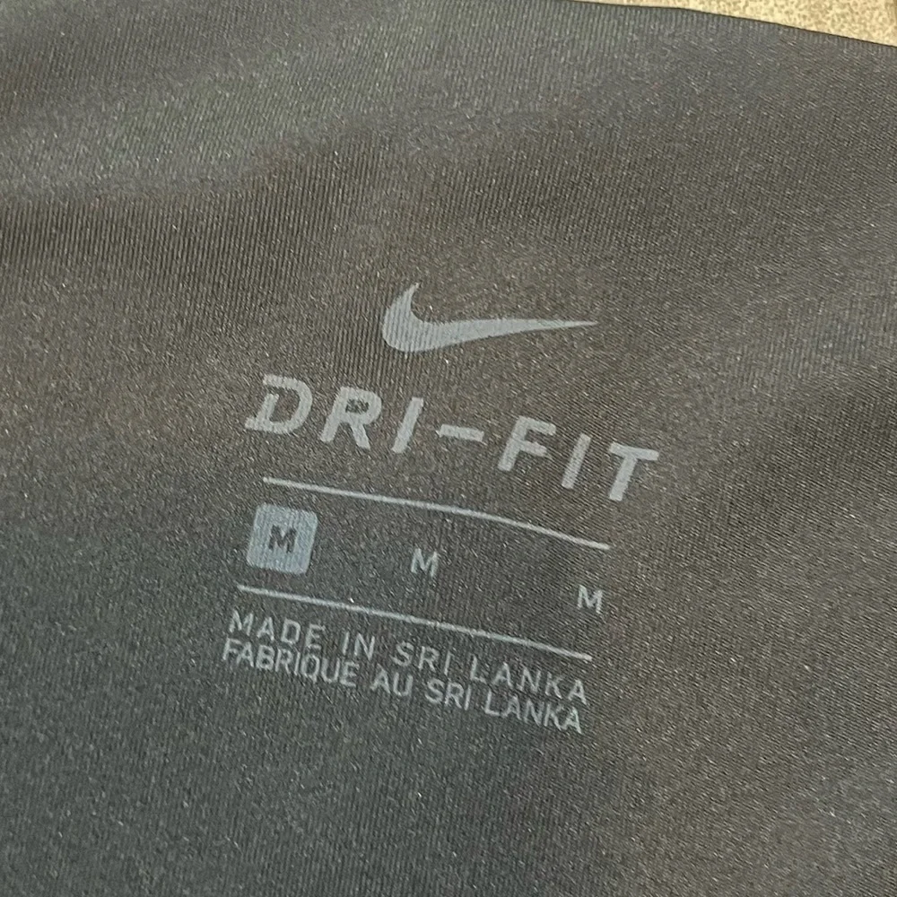 Nike Women's Yoga Crochet Edge 7/8 Leggings -- Black / Blue - Medium